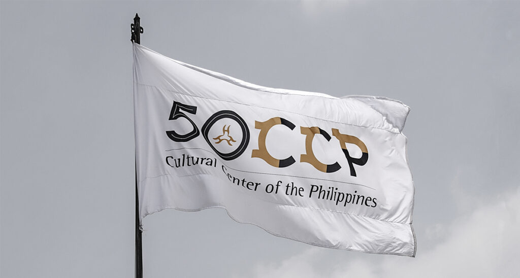 The 50th anniversary flag design of the CCP, showcasing the Baybayan font style.